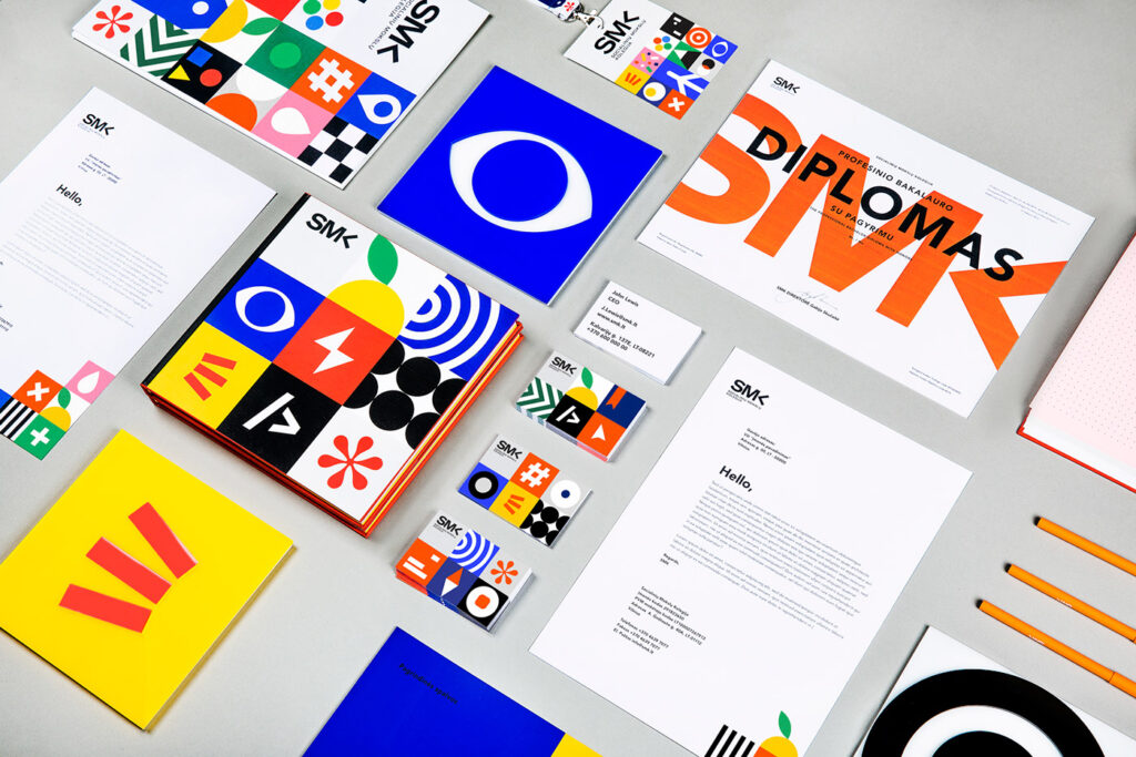 Flatlay photograph of SMK University of Applied Science's colourful university campaign branding